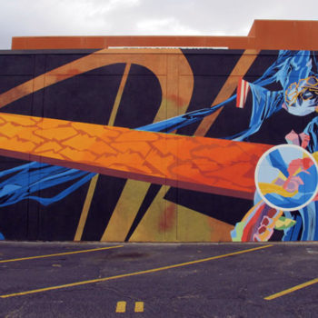 Dramatic and colorful mural of abstract shapes with lots of motion. It looks like outerspace.